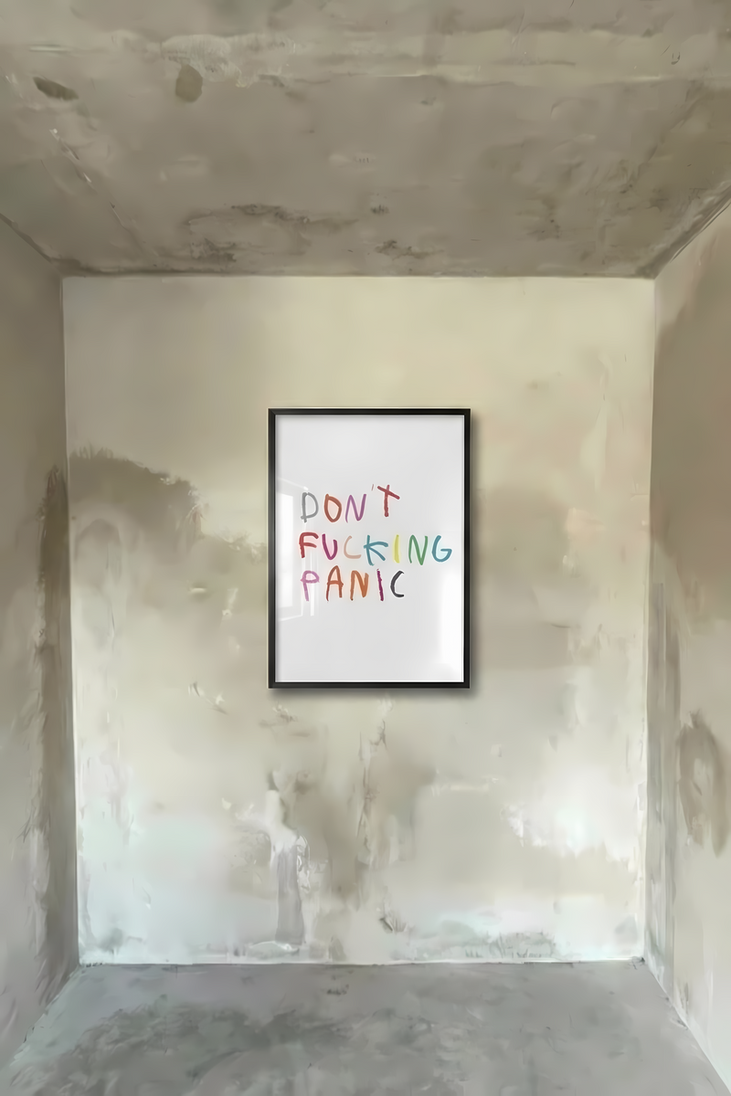 Black-framed typography poster with colorful handwritten 'Don't Fucking Panic' text
