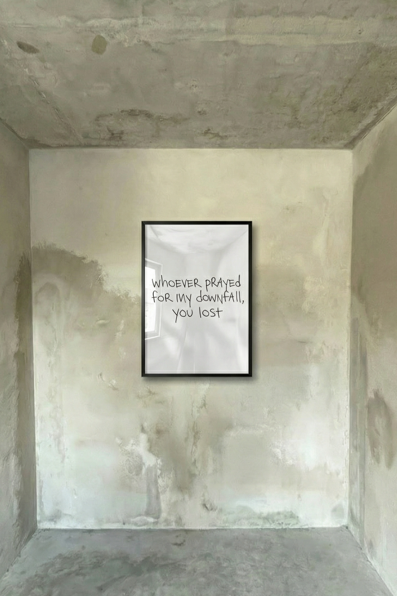 Framed poster with handwritten-style black text on light background, in a dark frame